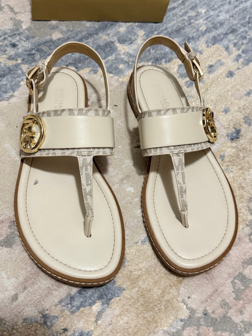 Michael Kors Cream Logo-Trim Thong Sandals with Gold Medallions